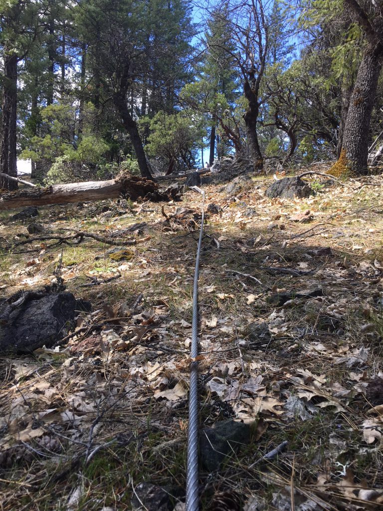 Pulling the cable across by hand