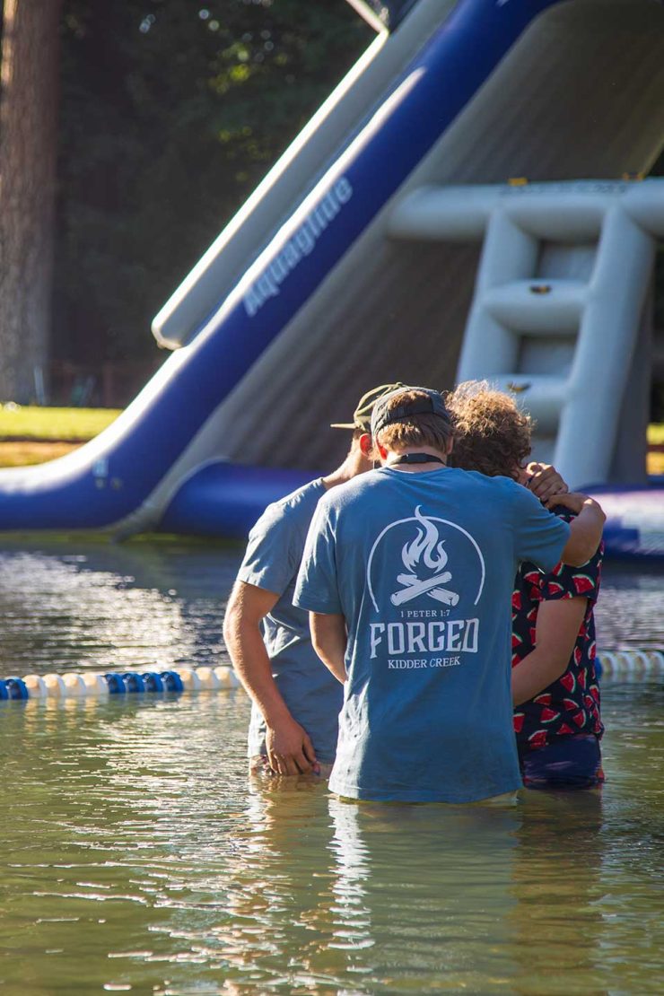 Kidder Creek Baptism, with "Forged by Fire" staff shirt